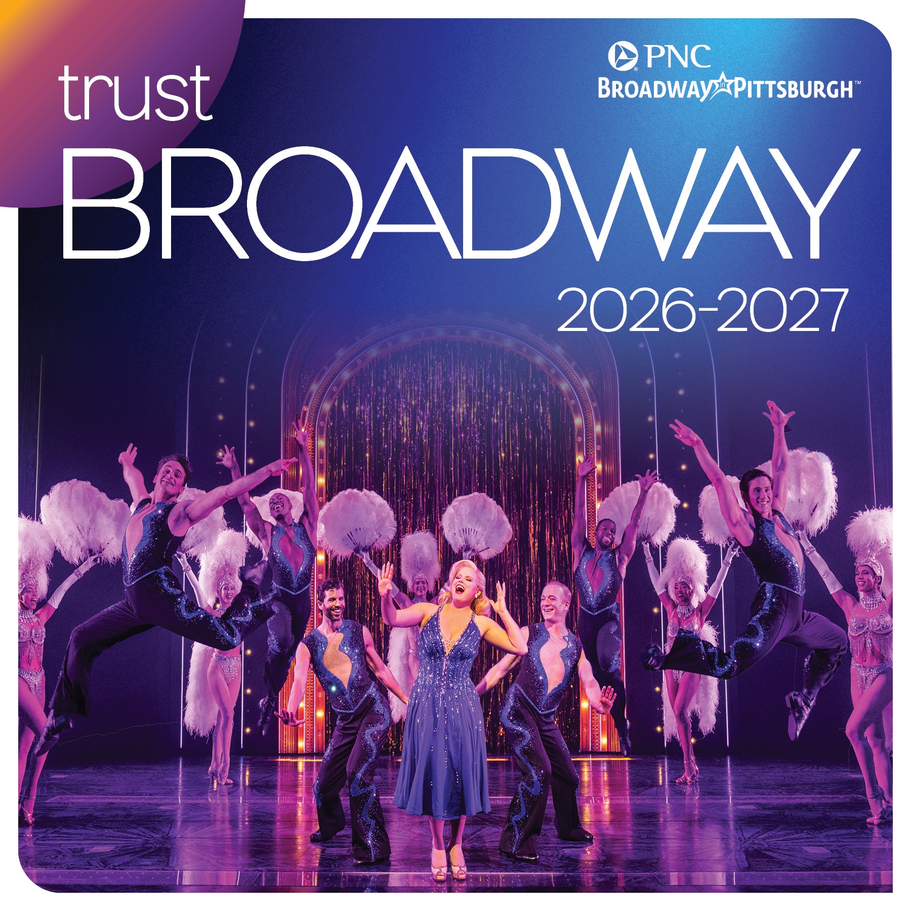 A woman in a blue dress sings on stage, surrounded by dancers in matching outfits holding large white feather fans. The text reads: “trust BROADWAY 2026-2027” with PNC Broadway in Pittsburgh logos.